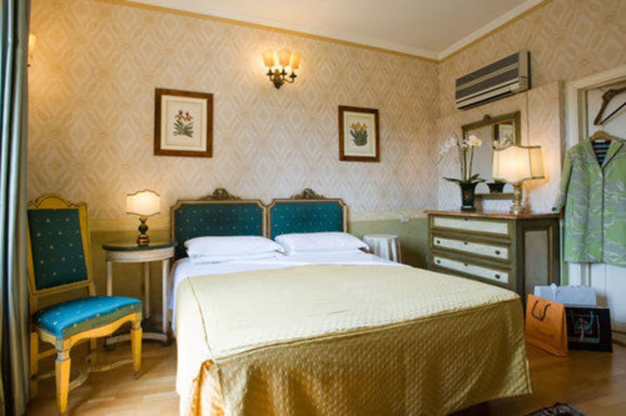 Hotel Hermitage Florença Quarto foto